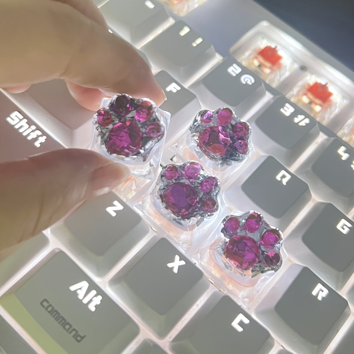 Upgrade Your Keyboard with These Adorable Transparent Cat Paw Keycaps - 4pcs DIY Set!